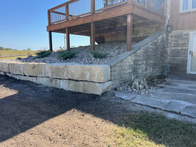 Retaining wall under deck.